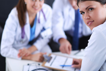 Obraz premium Happy medical team discussing and working together