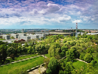 Fototapeta na wymiar view to football station Strahov from Petrinska rozhledna tower in sping Prague in Czech republic