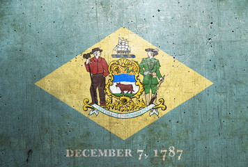 Flag of Delaware, USA, with an old, vintage metal texture