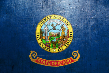 Flag of Idaho, USA, with an old, vintage metal texture