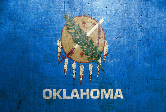 Flag of Oklahoma, USA, with an old, vintage metal texture