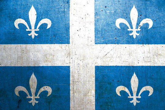 Flag of Quebec, Canada, with an old, vintage metal texture