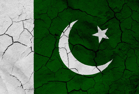 Flag of Pakistan, with dried soil texture