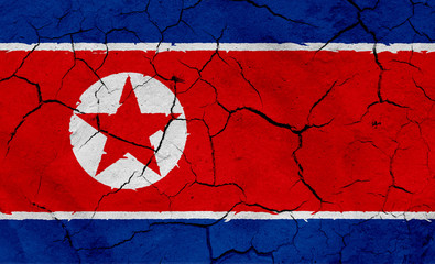Flag of North Korea, with dried soil texture