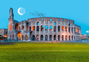 Plakat Night view of Colosseum in Rome, Italy