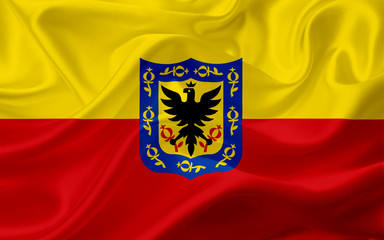 Fototapeta premium Flag of Bogota, Colombia, with waving fabric texture
