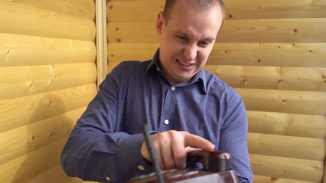 angry businessman shouting in the phone and then throws it with power up.