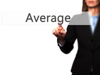 Average - Businesswoman hand pressing button on touch screen interface.