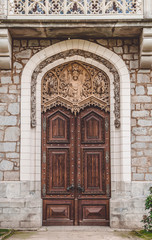 Fototapeta na wymiar Old wooden door. Old European House
