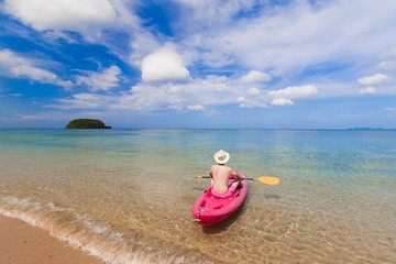 Fototapeta na wymiar Thailand. Man sea, kayak. Libong