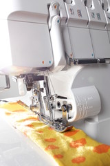Overlock sewing machine - view on working area - strong light and matte look