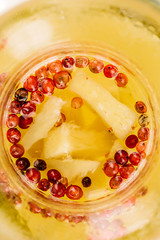 Healthy fruit  tea in glass kettle is heated candle tablet