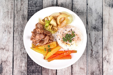Thai jasmine rice in American korean style, Rice with sliced pork steak.