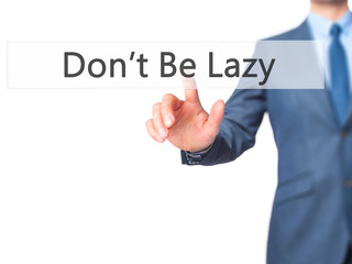 Don't Be Lazy - Businessman hand pressing button on touch screen interface.