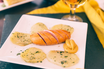 Sausage with potatoe and beer