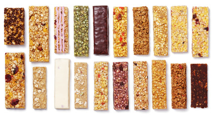 Top view of various healthy granola bars (muesli or cereal bar). Set of protein bar isolated on...