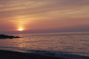 Obraz premium Colorful sky and the sea reflected in sunset. sunset on the sea with the sky in the clouds Turkey beach