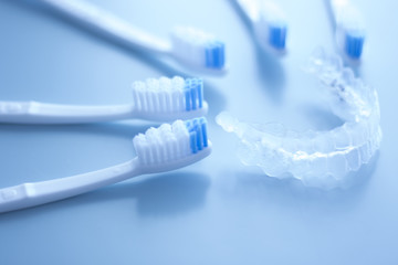 Dental aligners and toothbrush