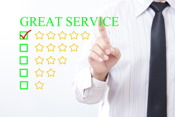 Businessman click concept GREAT SERVICE message,  Five golden stars.