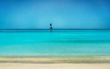 Fototapeta premium Yacht on carribean seashore