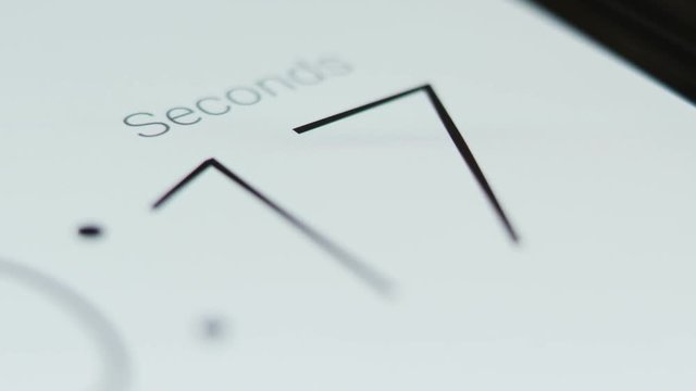 Thin number fonts countdown close up in white background.
Digital countdown timer in clean white background. 
