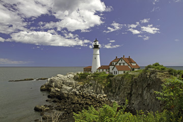 Fototapeta na wymiar Portland Head Lighthouse, in Fort Williams Park, guarding Portland Harbor, Cape Elizabeth,Maine