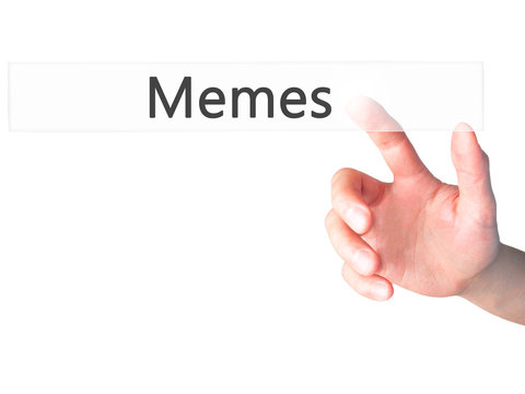 Memes - Hand pressing a button on blurred background concept on visual screen.