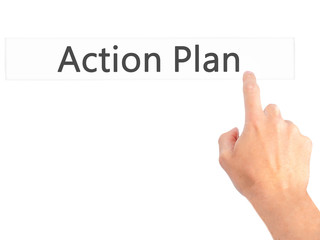Action Plan - Hand pressing a button on blurred background concept on visual screen.
