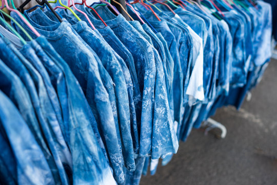 Blue Indigo Kram T-shirt Hanging in shop
