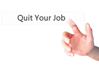 Quit Your Job - Hand pressing a button on blurred background concept on visual screen.