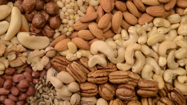 Nuts mix in a canvas bag in table.