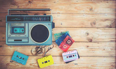 Top view hero header - retro technology of radio cassette recorder music with retro tape cassette...