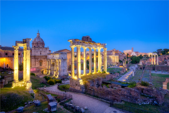 Forum Romanum archeological site in Rome after sunset