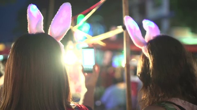 Yangon, girls with funny bunny ears