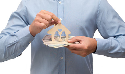 symbol of home and family standing on the basis of the American currency 