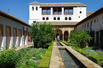 General view of The Generalife courtyard, with its famous fountain and garden. Alhambra de Granada complex, Spain