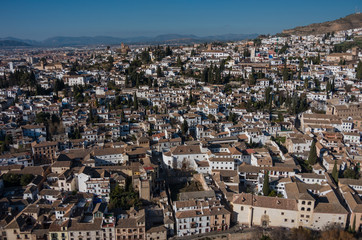 Fototapeta na wymiar Cityscape. Panorama view of Granada old city from tower of Alhambra Palace. Granada, Spain.