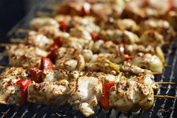 Roasting meat on barbecue on an outdoors grill