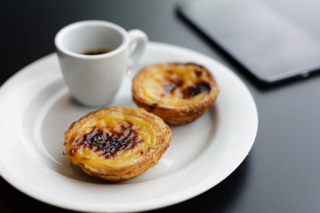 Pastel de nata and coffee