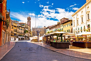 Piazza delle erbe in Verona street and market view