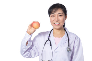 Asian female doctor holding apple with stethoscope