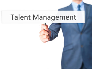 Talent Management - Businessman hand holding sign