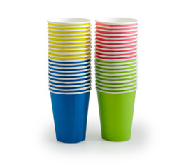 Piles of the disposable paper cups in different colors