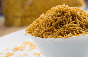 Aloo Bhujia in white bowl on isolated background
