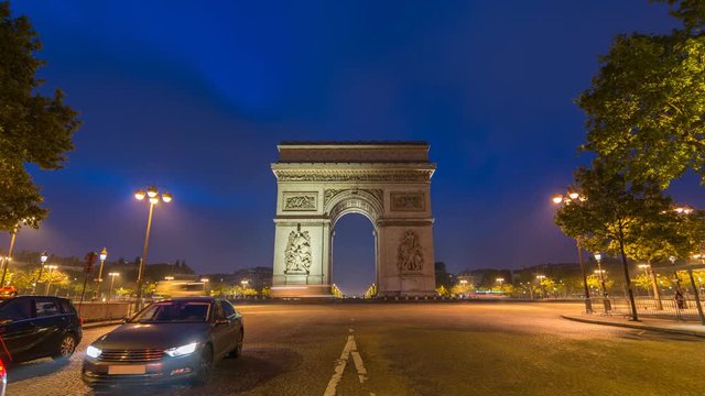 Paris city skyline night to day timelapse at Arc de Triomphe and Champs Elysees, Paris, France, 4K Time lapse