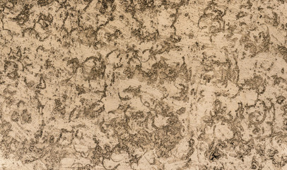 Brown texture on clay plaster