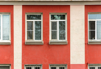 Naklejka premium The old Soviet two-storey building of red color