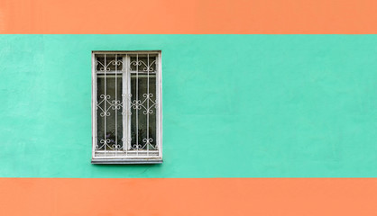 Window on free  green orange wall