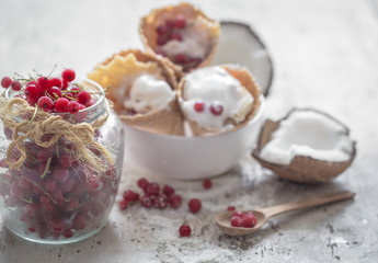 ice cream in a waffle cone and berries