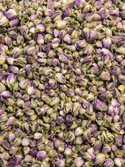 Background of dry herbal tea consisting of buds of roses